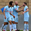 Valley players celebrate with Massiah McDonald